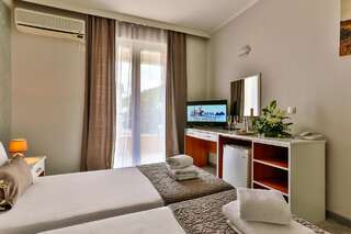 Отель Hotel Magnolija Будва Двухместный номер эконом-класса с 2 отдельными кроватями-3